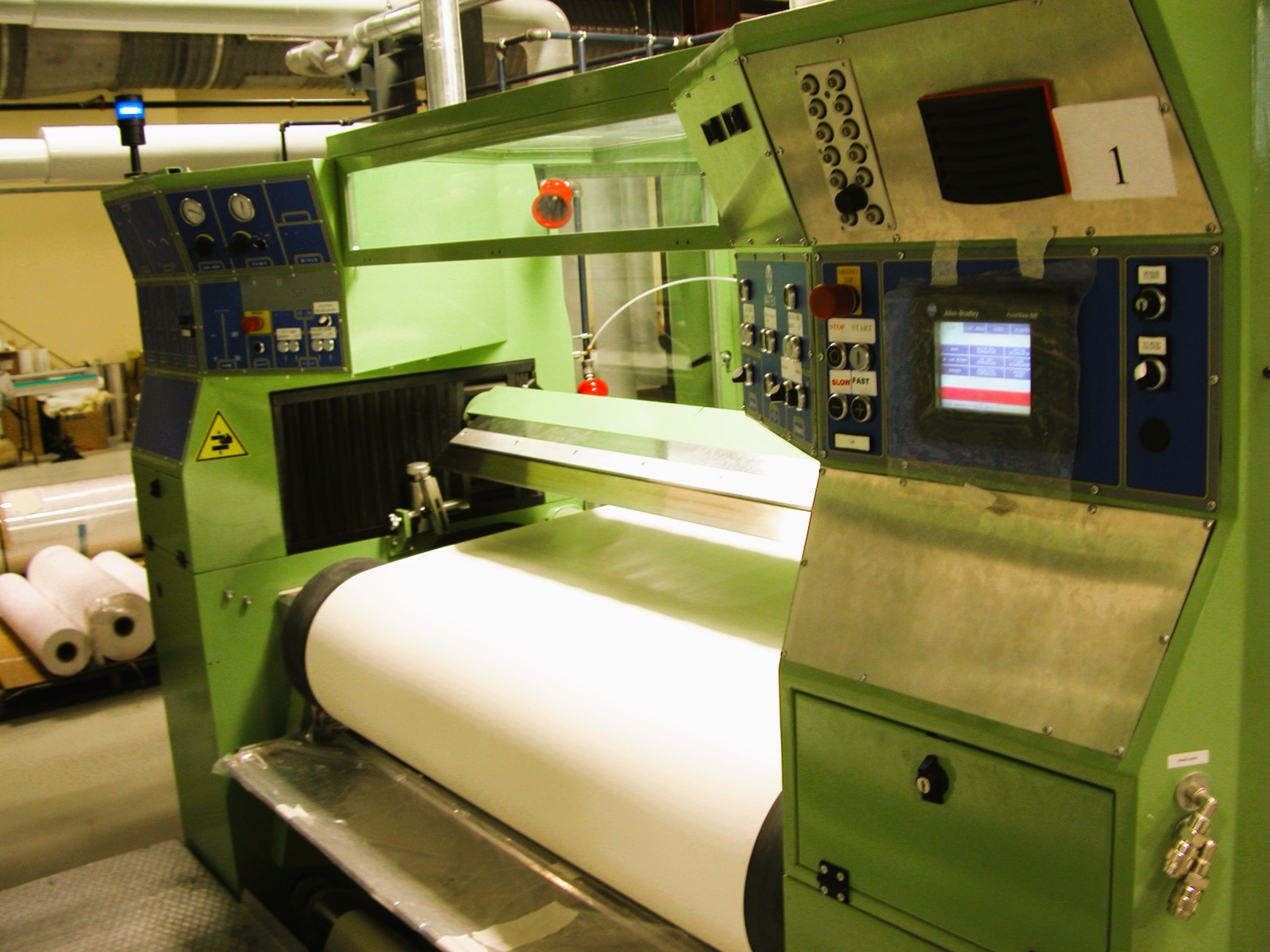 Knife-over-roll coating station