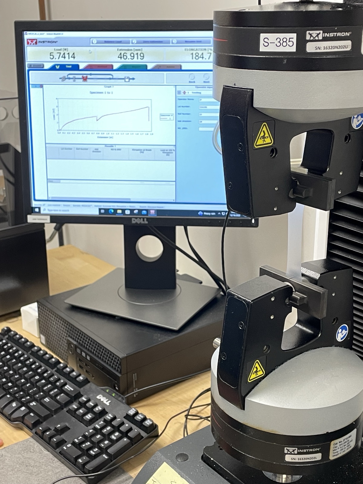 Tensile tester with a sample loaded